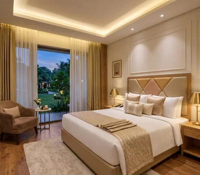 Guest room with king bed, gold cushions and garden view through glass doors at Barsana Resort